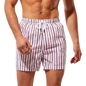 image:imageSolid amp Striped Mens Swimming Trunks with Liner  The Classic Small Navy X Red Logo Stripe